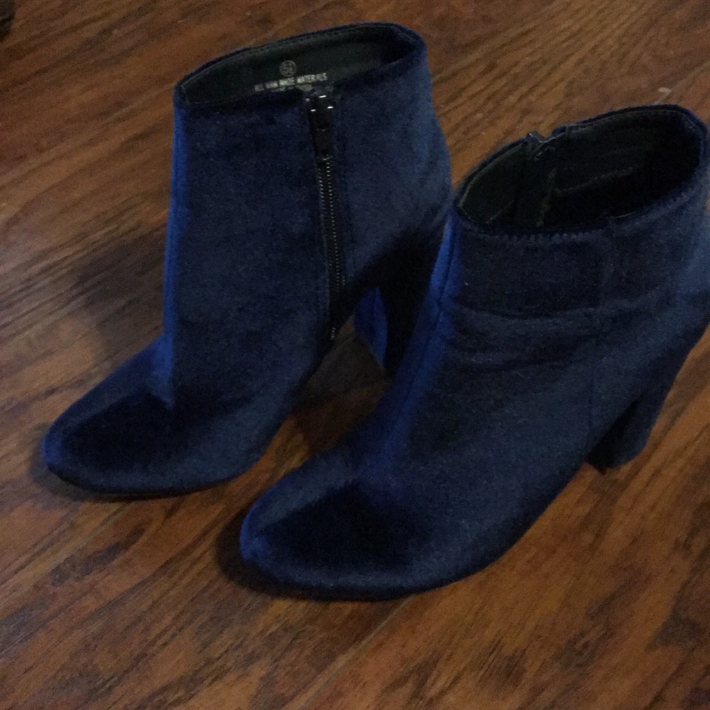 Blue high heeled boots